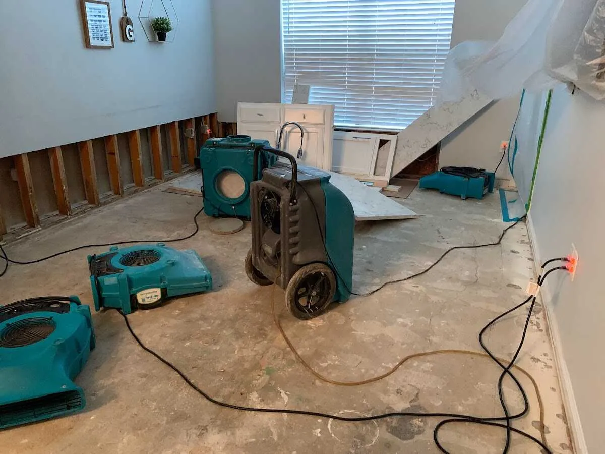 Dehumidifier in flood-cut room for Water Damage Restoration in Mount Healthy